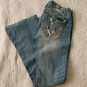 Size 24 Miss Me jeans.